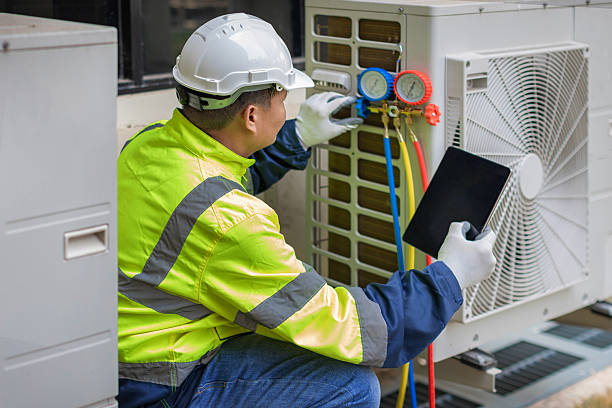 Professional Air Conditioning Repair technician working in Colon, MI